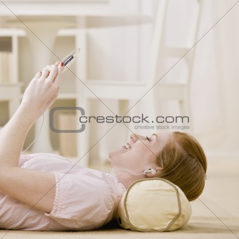 Young Woman Listening to Music