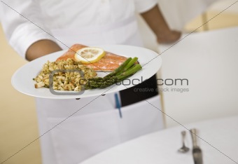 Server with Plate of Food