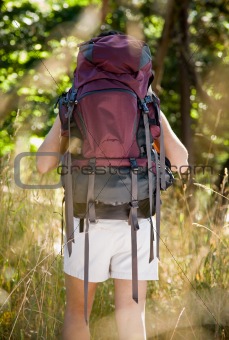Woman with backpack hiking