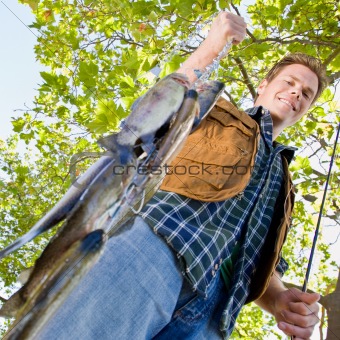 Fisherman carrying fish