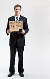 Businessman with sign ill work for food