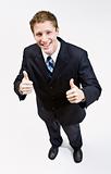 Businessman giving thumbs up gesture