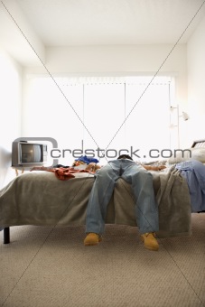 Man Lying on Bed