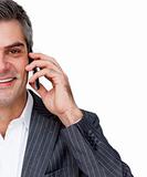 Close-up of a smiling businessman on phone
