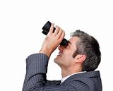 Businessman looking up through a pair of binoculars