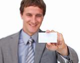 Attractive Businessman showing a business card 