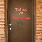 Door to tattoo parlor.