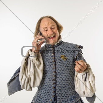 Shakespeare talking on phone.