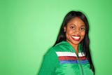 African-American woman in green coat.