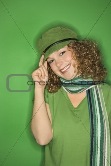 Young Caucasian woman wearing hat and scarf.