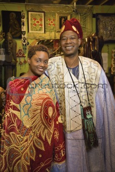 Portrait of father and daughter wearing traditional African clot