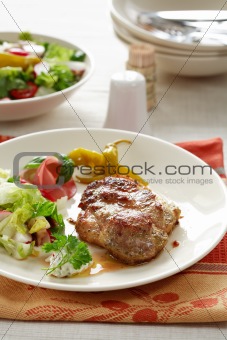 Steaks with mixed salad