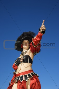 Woman dressed in pirate costume.