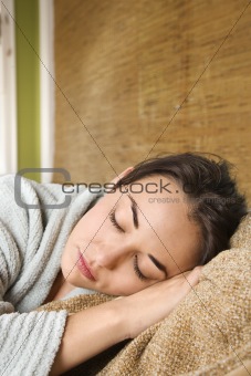 Woman in robe sleeping.