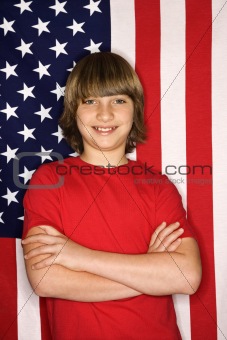 Caucasian boy against American flag.