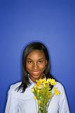 African-American teen girl with flowers.