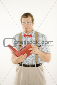Young man with book open.