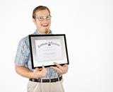 Young man holding certificate and smiling.