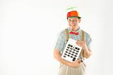 Young man dressed like nerd holding large calculator.