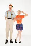 Young man dressed like nerd  with young woman in nerdy outfit.