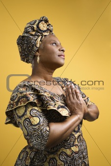 Woman dressed in African costume.