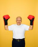 Man wearing boxing gloves.