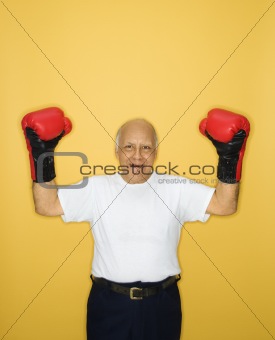 Man wearing boxing gloves.
