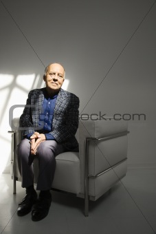 Man sitting in chair.