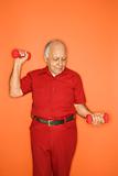 Man lifting hand weights.