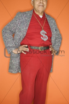 Man wearing money sign necklace.