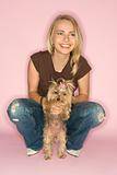 Woman with Yorkshire Terrier dog.