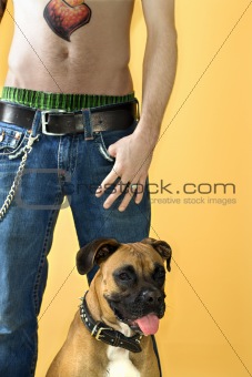 Man with Boxer dog.