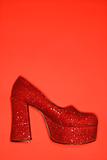 Red glitter high heel shoe.