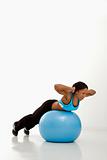 Woman exercising with ball.