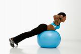 Profile of woman exercising.