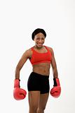 Woman wearing boxing gloves.