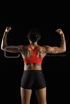 Back of muscular woman.