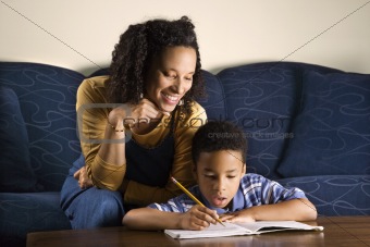 Woman Helping Son with Homework