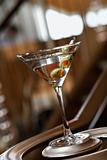 Martini With Olives on Banister