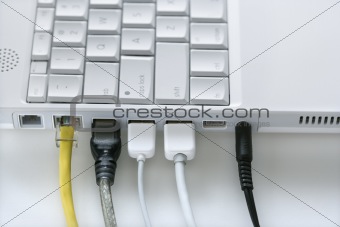 Cords Plugged Into Laptop Computer