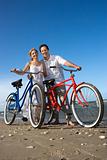 Couple with Bikes at the Beach