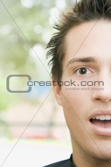 Close-up of a Surprised Young Man