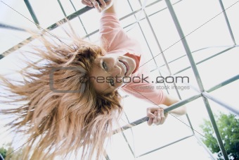 Young Woman on Playground Equipment