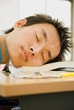 Student Sleeping With Head on Desk