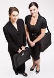 Businesswomen carrying briefcases