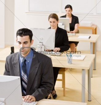Business people typing on computer