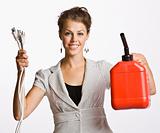 Businesswoman holding electrical plugs and gas can
