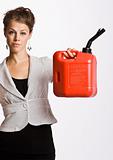 Businesswoman holding gas can