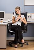 Businesswoman talking on telephone