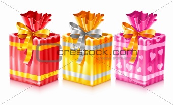 set of packaged holiday gifts with bow